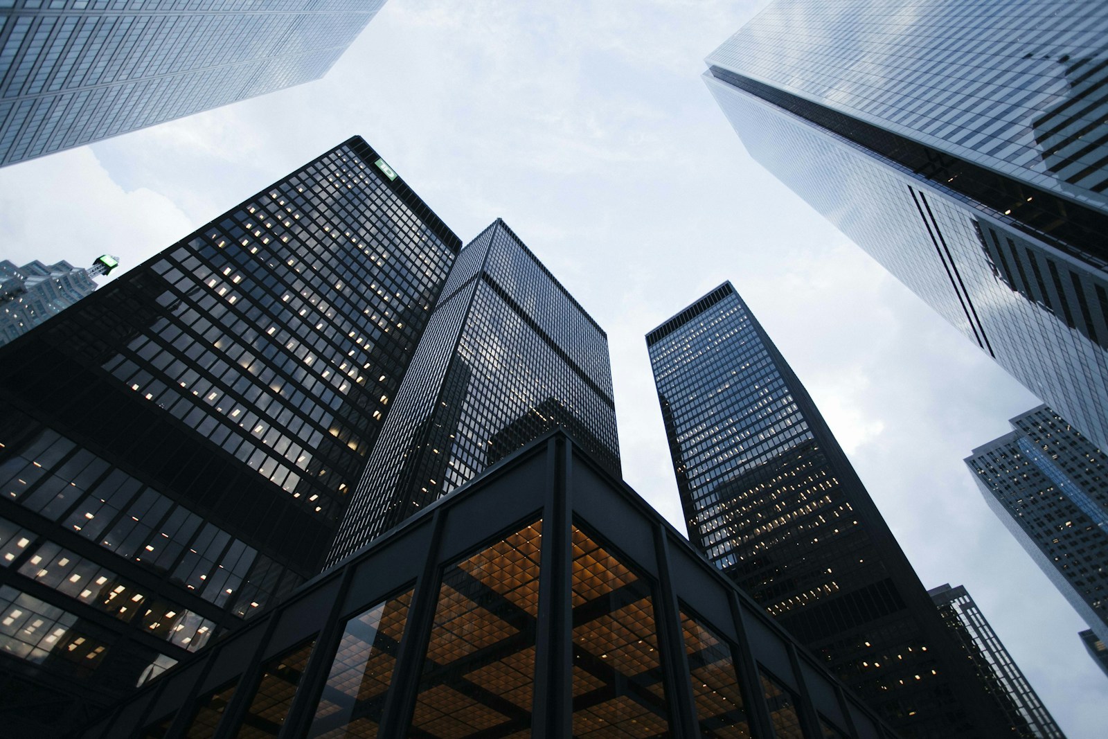 Modern glass office towers viewed from below